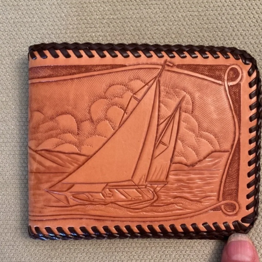 Unused vintage 50s 60s wallet billfold, embossed leather with sailboat and wheel